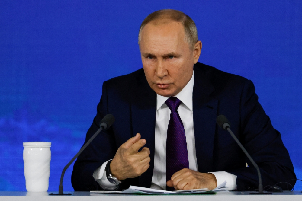 Russian President Vladimir Putin speaks as he attends his annual end-of-year news conference in Moscow, Russia, December 23, 2021. REUTERS/Evgenia Novozhenina