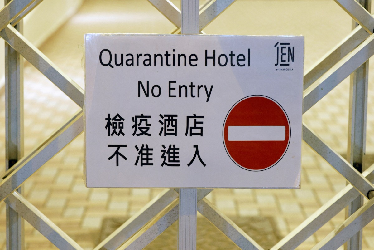 FILE PHOTO: A sign is seen inside a quarantine hotel, during the coronavirus disease (COVID-19) pandemic, in Hong Kong, China August 30, 2021. Picture August 30, 2021.REUTERS/Tyrone Siu/File Photo
