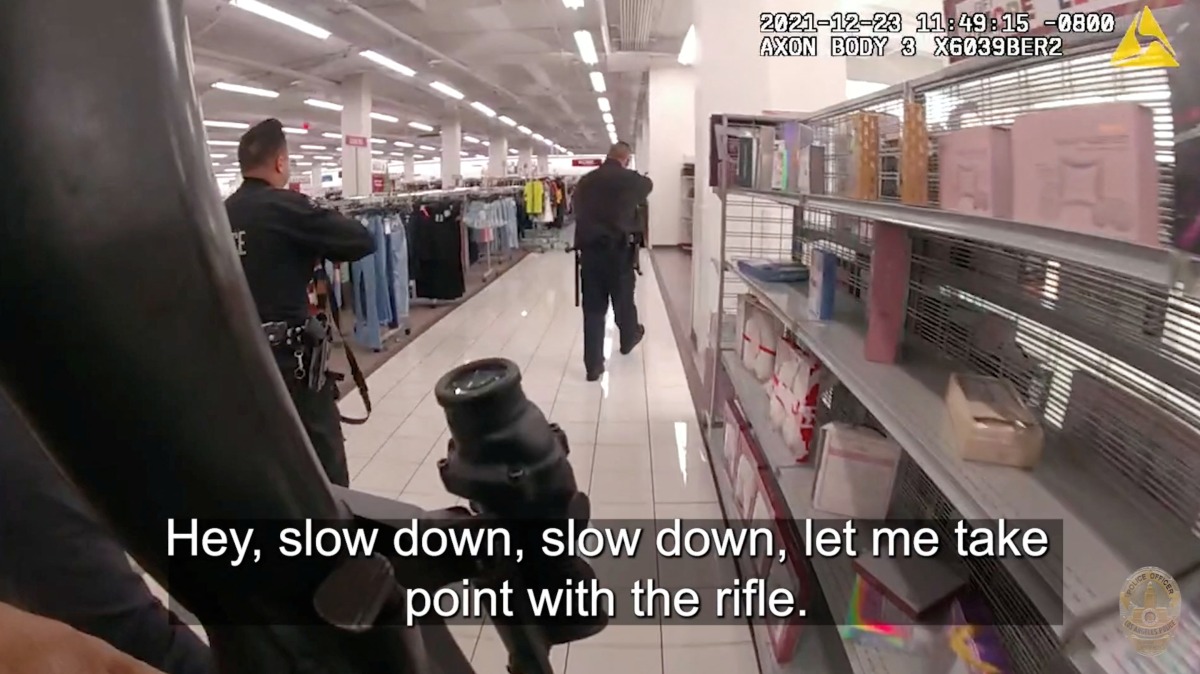 Bodycam footage shows Los Angeles Police Department officers walking around a shopping mall in North Hollywood, California, U.S., December 23, 2021 in this still image taken from a video released by the LAPD after the accidental shooting of a teenage girl killed in a clothing store when a bullet pierced the wall of her dressing room as officers opened fire on an assault suspect. Video taken December 23, 2021. LAPD/Handout via REUTERS 
