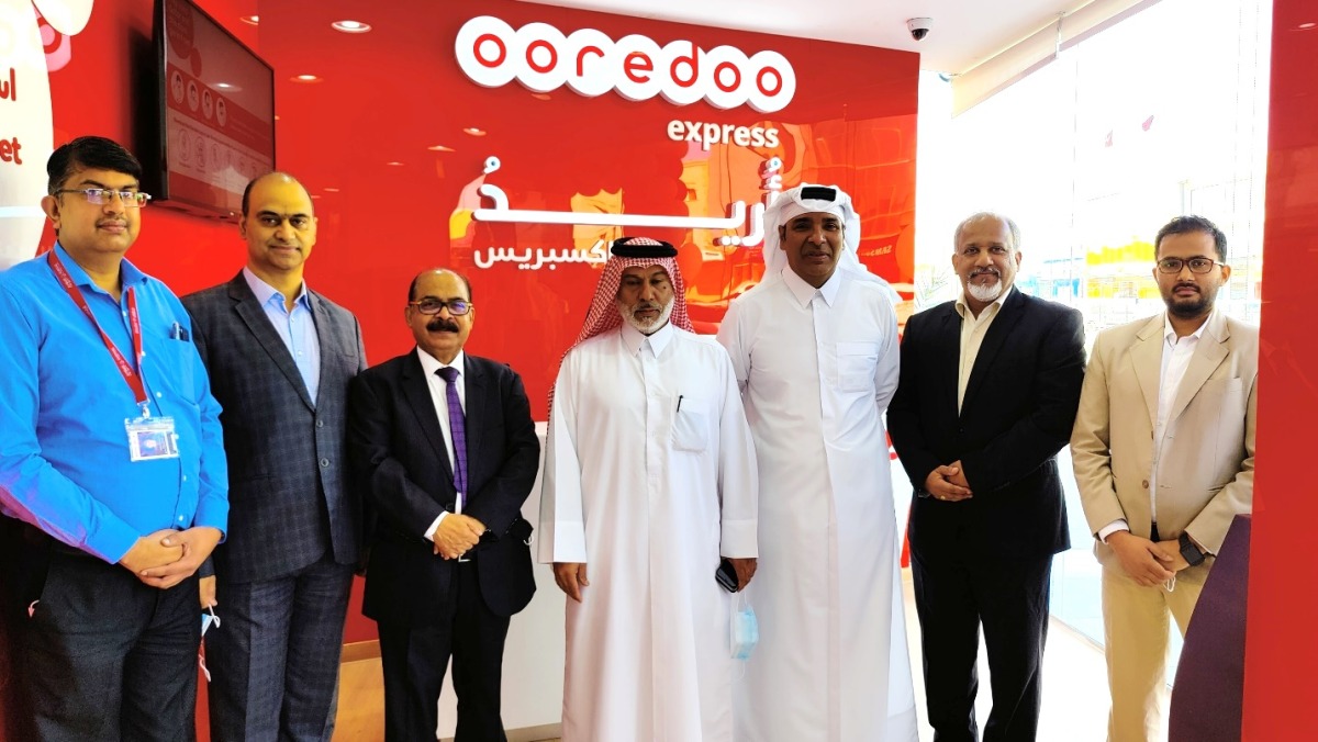 Officials during the opening of Ooredoo Express shop at Al Shafi Street branch of Jumbo Electronics in New Rayyan. 
