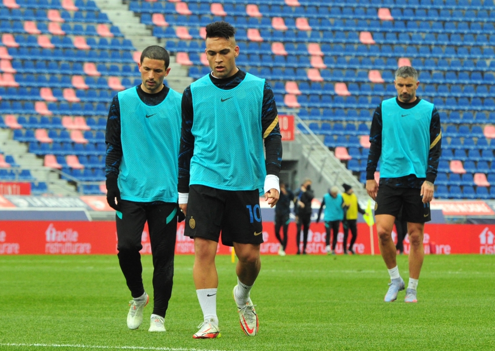 Inter Milan's Lautaro Martinez is seen on the pitch after Bologna declared that they would not play the match because players and staff have tested positive for Covid-19 REUTERS/Jennifer Lorenzini
