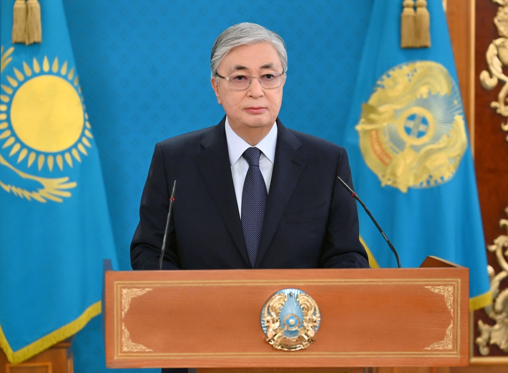 Kazakh President Kassym-Jomart Tokayev speaks during a televised address to the nation following the protests triggered by fuel price increase in Nur-Sultan, Kazakhstan January 7, 2022. Official website of the President of Kazakhstan/Handout via REUTERS.