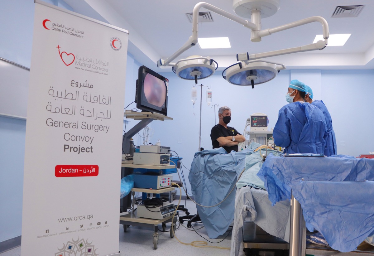 A beneficiary receiving treatment under QRCS’s medical convoy initiative in Amman.