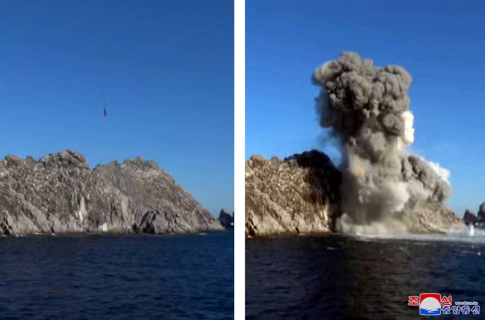 A view shows what appears to be missiles strucking a target off North Korea?s east coast, in North Korea, in this photo released January 14, 2022 by North Korea's Korean Central News Agency (KCNA). KCNA via Reuters