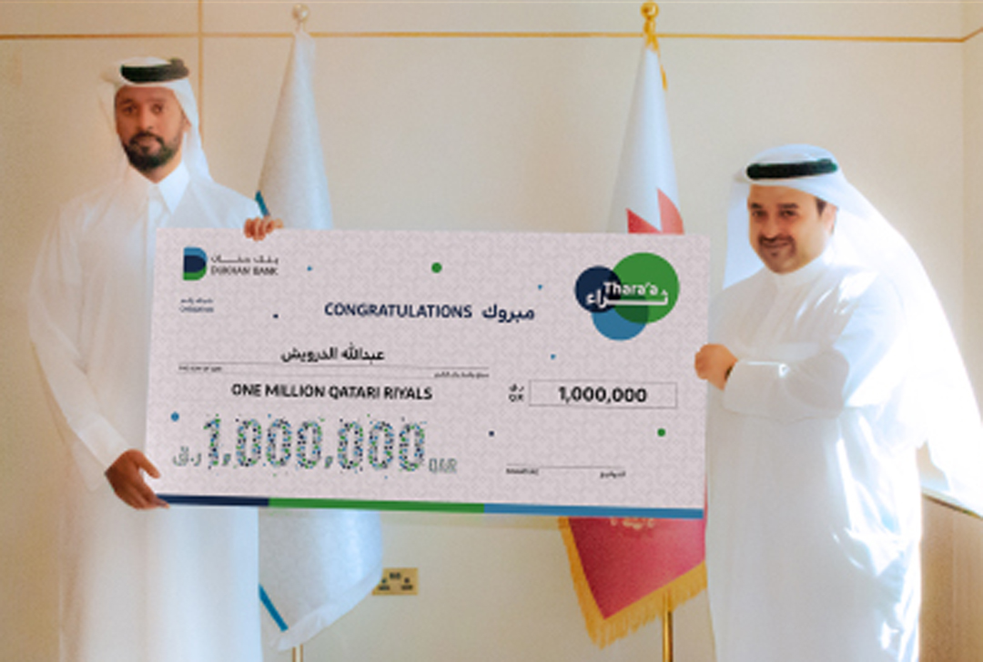 Dukhan Bank customer Abdulla Al Darwish receiving the grand prize.  