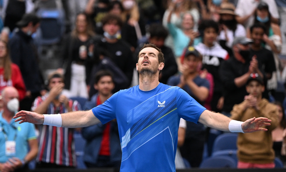 Britain's Andy Murray celebrates winning his first round match against Georgia's Nikoloz Basilashvili REUTERS/James Gourley
