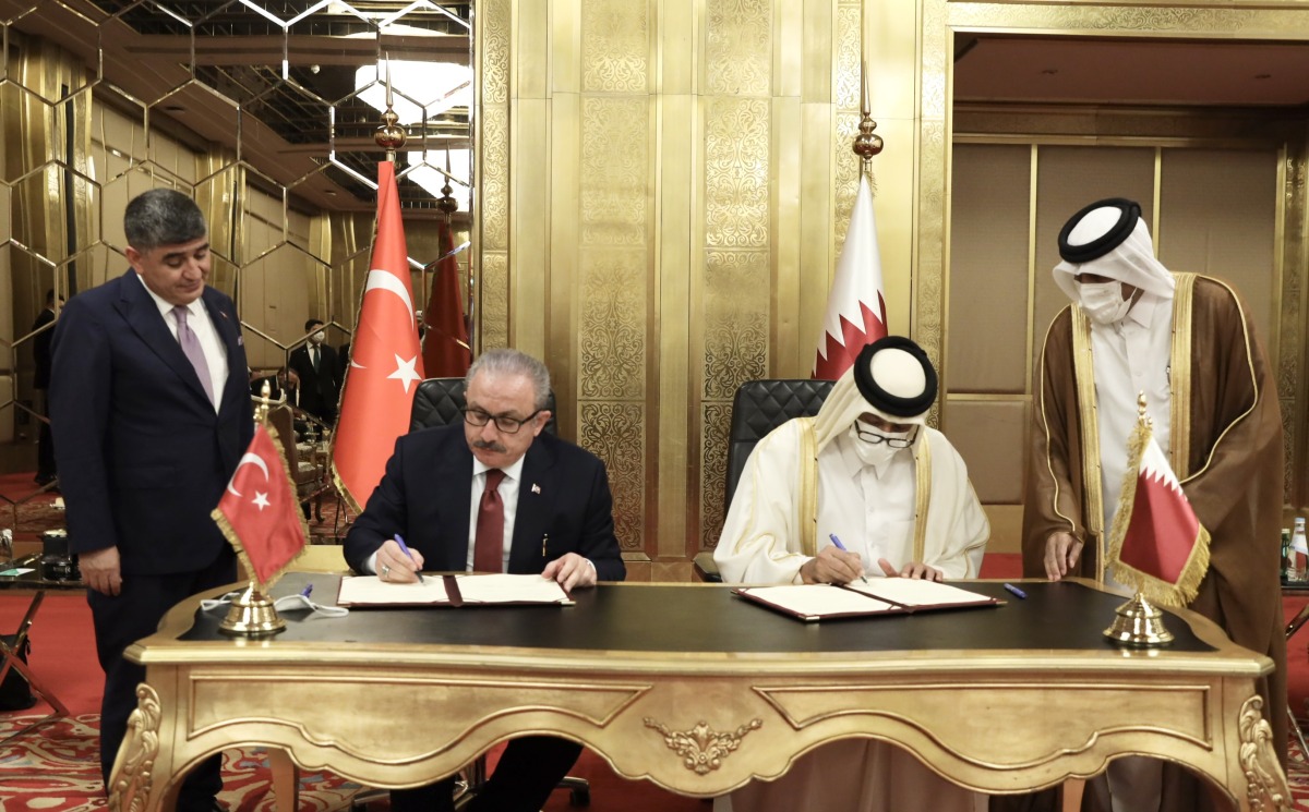 Shura Council Speaker H E Hassan bin Abdullah Al Ghanem and Speaker of the Grand National Assembly of Turkey H E Mustafa Sentop signing the MoU.