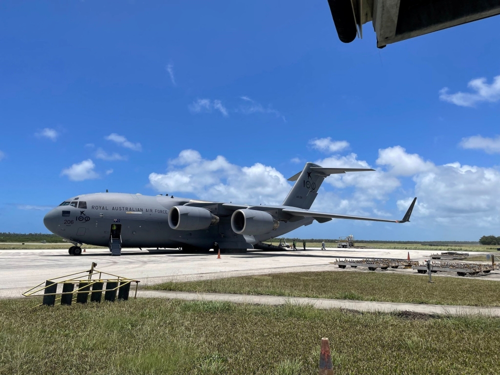 A Royal Australian Air Force C-17A Globemaster III aircraft delivers the first load of Australian Aid at Tonga's Fua'Amotu international airport January 20, 2022. Australian Department of Defence/Handout via Reuters