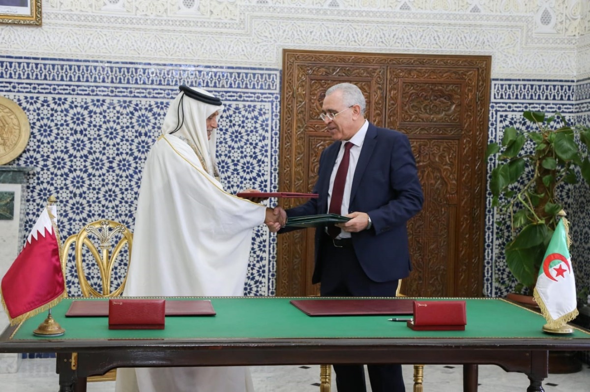 Minister of Justice H E Masoud bin Mohammed Al Amri and Algeria's Minister of Justice H E Abdul Rashid Tabbi at the MoU signing event.
