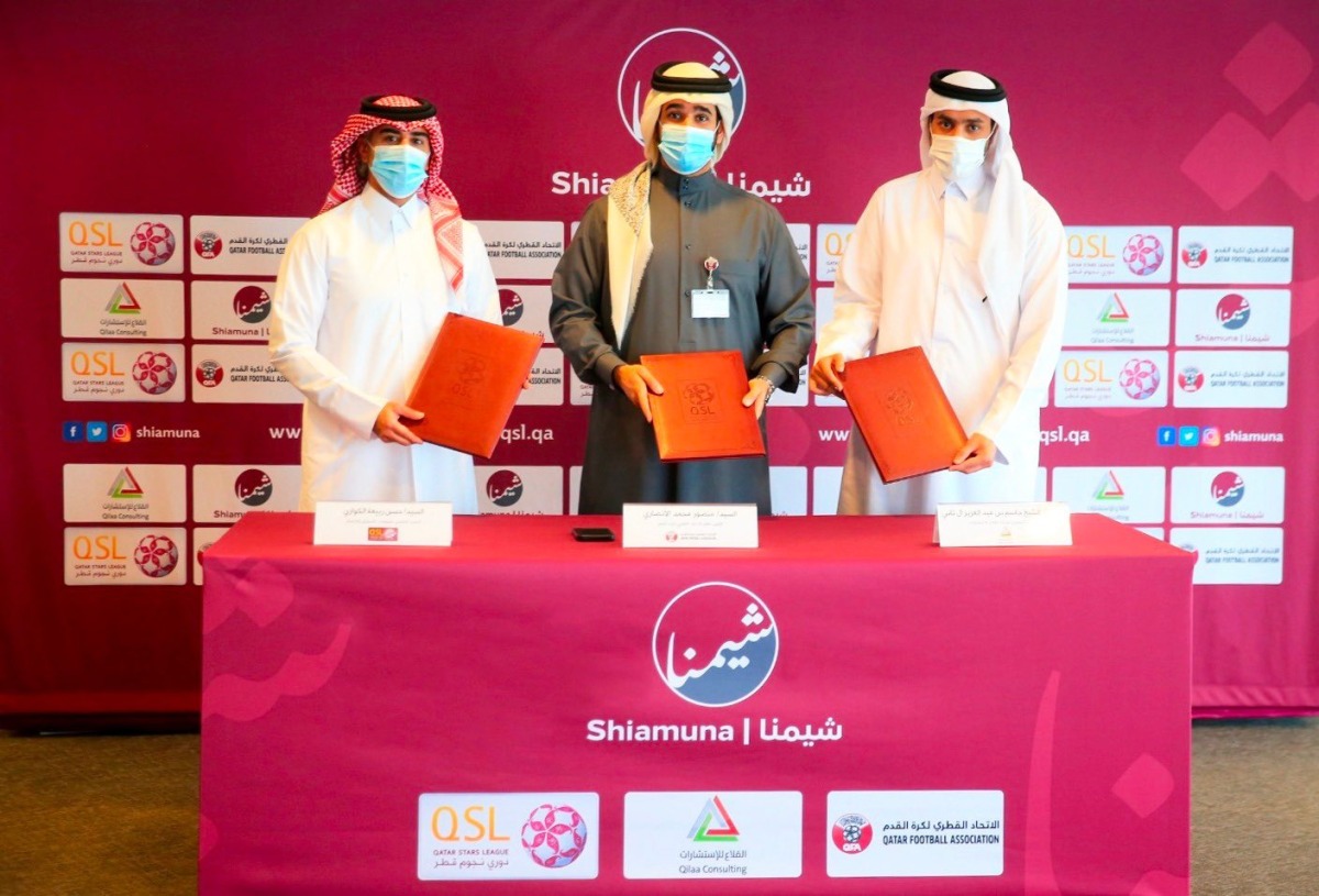 QFA Secretary-General Mansour Al Ansari, Executive Director of Sales, Marketing and Communication at QSL, Hassan Rabia Al Kuwari, and Qilaa Consulting CEO Sheikh Jassim bin Abdulaziz Al Thani pose for a photograph after signing the partnership agreement, yesterday.