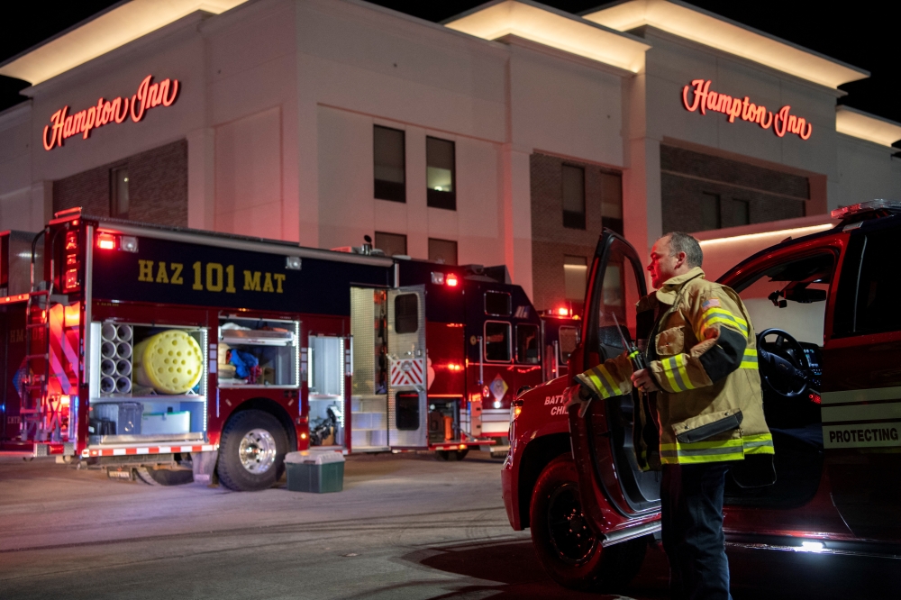 Hazmat crews respond to a mass casualty incident at a Hampton Inn, after multiple people were reported unconscious in the pool area, in Marysville, Ohio, U.S., January 29, 2022. REUTERS/Gaelen Morse