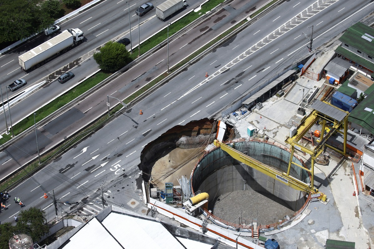 An aerial view shows part of an expressway collapsed above a construction site where Spain's Acciona SA was excavating a tunnel for a new metro line in Sao Paulo, Brazil, February 1, 2022. REUTERS/Carla Carniel
