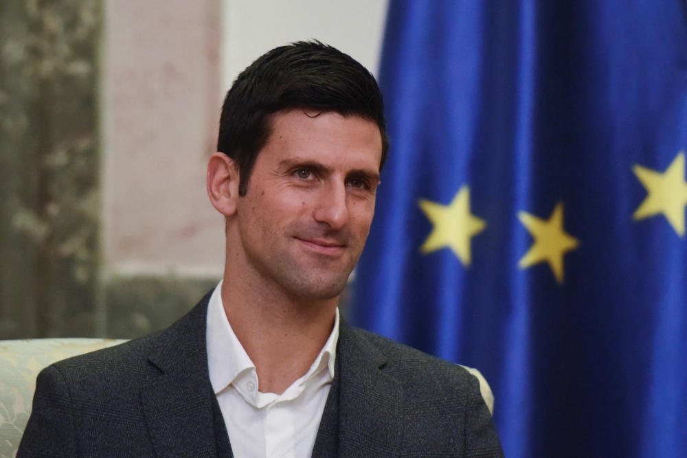 Serbian tennis player Novak Djokovic speaks with Serbia's President in Belgrade, Serbia, February 3, 2022. REUTERS/Zorana Jevtic