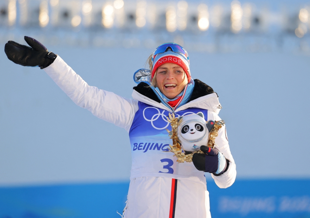 Gold medalist, Therese Johaug of Norway, celebrates after winning. Reuters/Marko Djurica