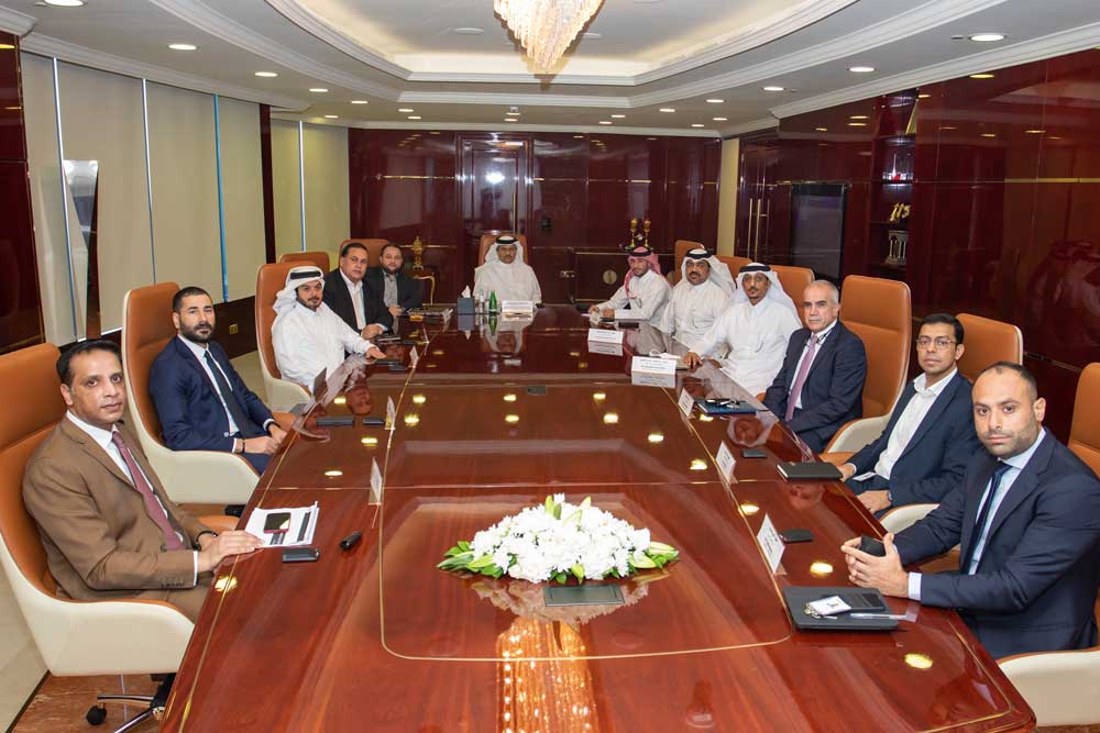 UDC President, CEO and Member of the Board, Ibrahim Jassim Al Othman (centre) and others at the company's annual staff gathering. 