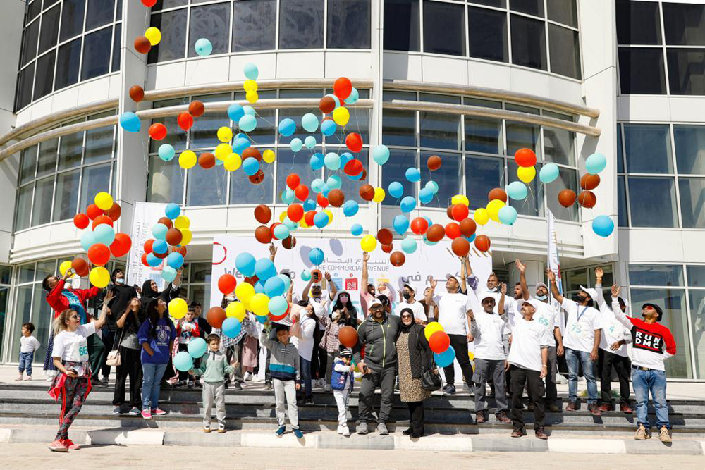 The Commercial Avenue celebrating the NSD activities by releasing colourful balloons.