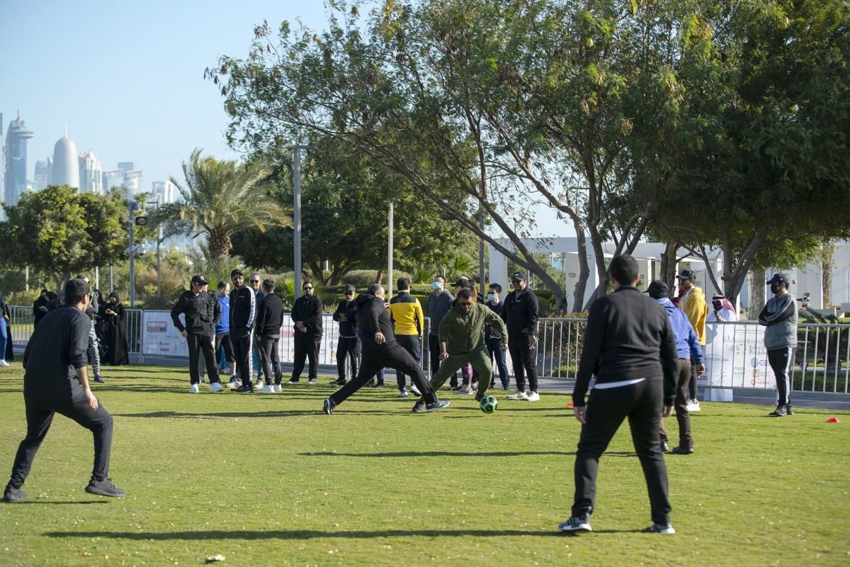 Huawei staff take part in Qatar National Sport Day activities.  