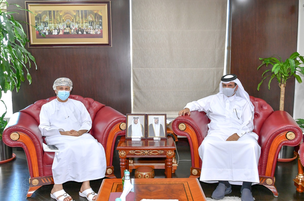 Qatar Chamber First Vice-Chairman Mohamed bin Towar Al Kuwari (right) with the Head of the Commercial Representative of the Sultanate of Oman in Qatar Ishaq bin Khalfan Al Busaidi during a meeting in Doha, yesterday.  