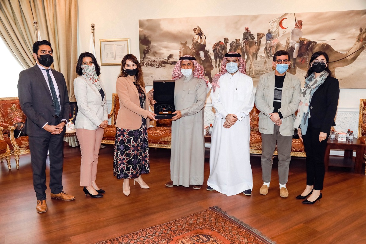 QRCS Secretary-General Ali bin Hassan Al Hammadi with a delegation from the embassy of the United States in Doha.