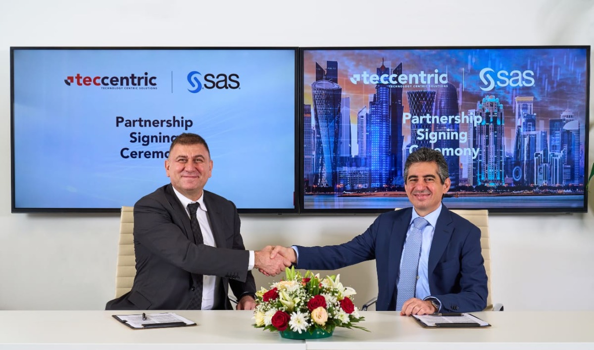 Bassel Al-Halabi (right), Managing Director at TecCentric, with Tayfun Topkoc, Managing Director, Middle East, and Africa, Turkey and Central Asia at SAS during the signing ceremony in Doha. 