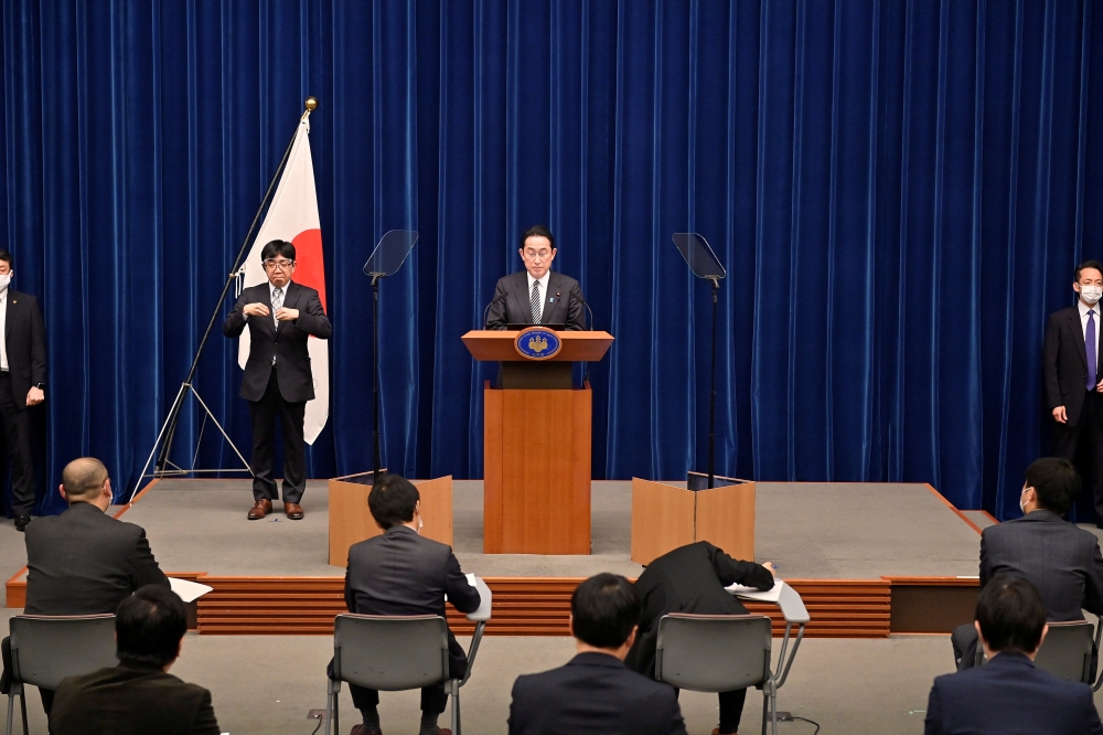 Japan's Prime Minister Fumio Kishida attends a news conference on the coronavirus (COVID-19) measures, in Tokyo, Japan, February 17, 2022. David Mareuil/Pool via Reuters