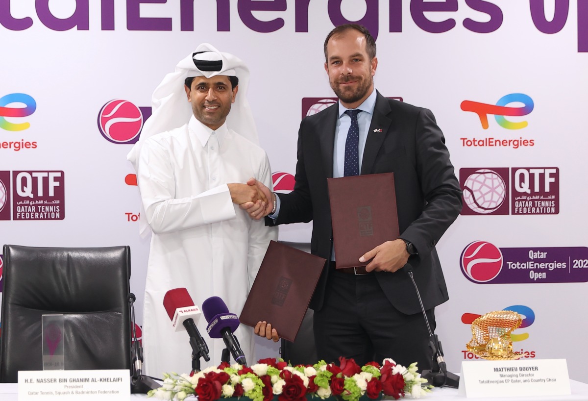 QTSBF President Nasser bin Ghanim Al Khelaifi and TotalEnergies EP Qatar Managing Director & Country Chair Matthieu Bouyer shake hands during the agreement signing ceremony.