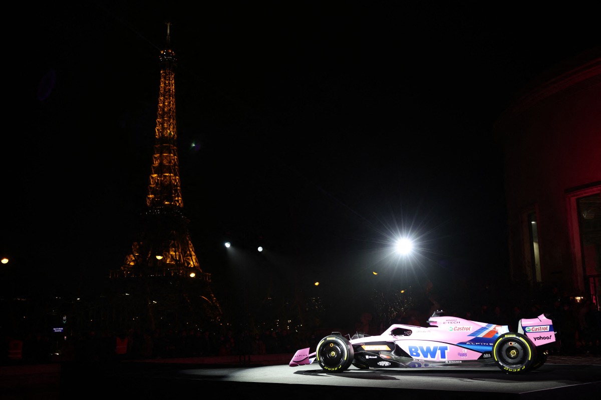 The new Alpine A522 car is seen with the Eiffel Tower during the launch REUTERS/Sarah Meyssonnier
