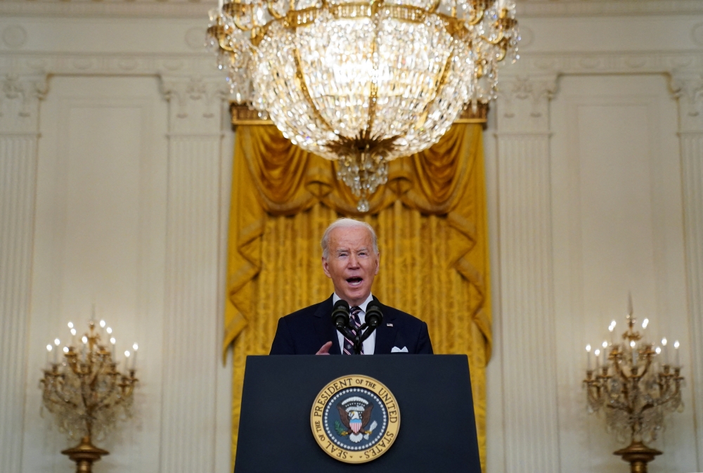 U.S. President Joe Biden provides an update on Russia and Ukraine during remarks in the East Room of the White House in Washington, U.S., February 22, 2022. REUTERS/Kevin Lamarque
