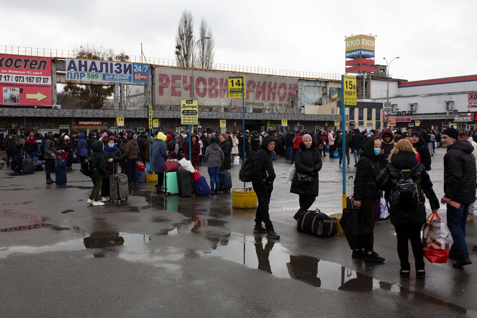 People gather at a bus station as they try to leave the city of Kyiv, Ukraine February 24, 2022. REUTERS/Volodymyr Petrov


