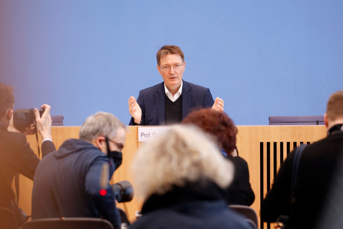 German Health Minister Karl Lauterbach gestures during a news conference on the current situation regarding the coronavirus disease (COVID-19) pandemic, in Berlin, Germany, February 25, 2022. REUTERS/Michele Tantussi
