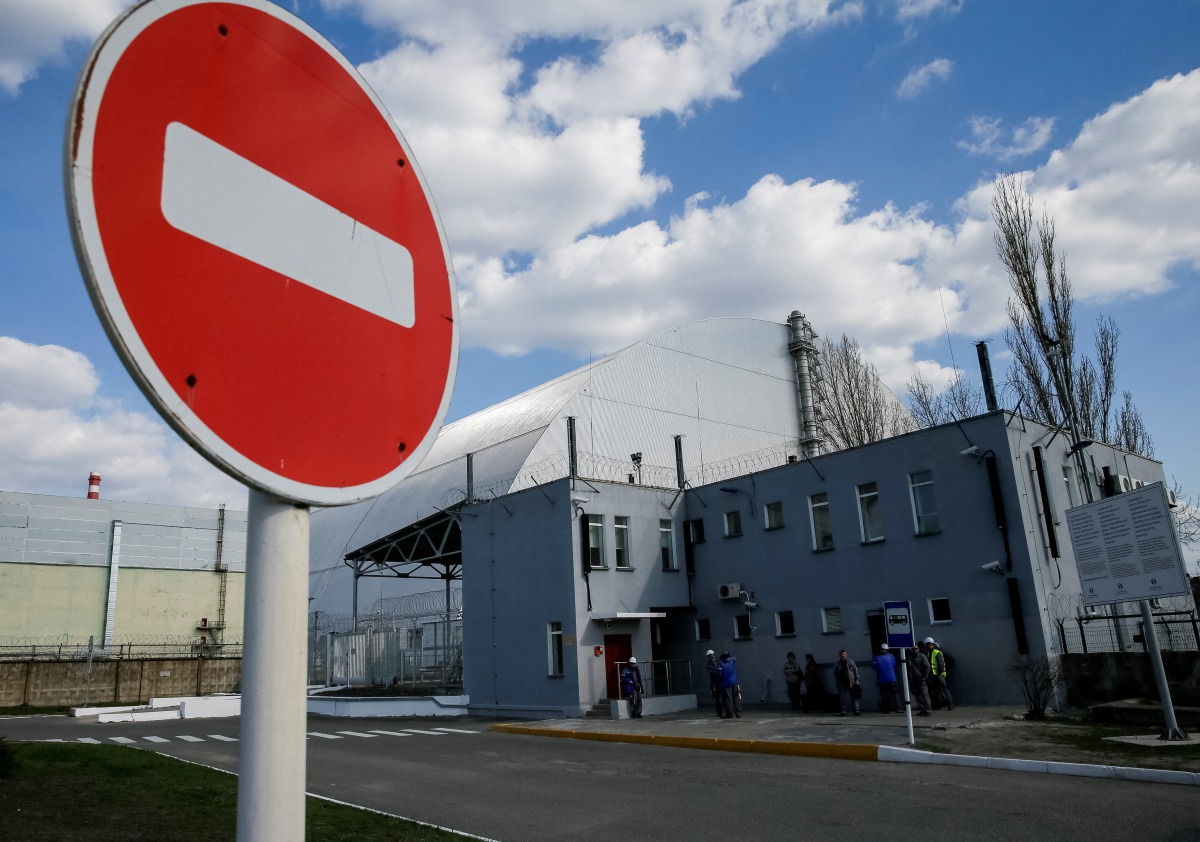 FILE PHOTO: A general view shows a New Safe Confinement (NSC) structure over the old sarcophagus covering the damaged fourth reactor at the Chernobyl nuclear power plant, in Chernobyl, Ukraine April 20, 2018. REUTERS/Gleb Garanich/File Photo
