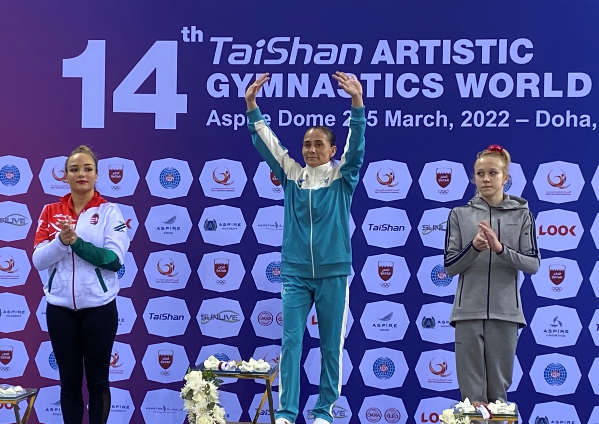 Uzbekistan’s Oksana Chusovitina celebrates on the podium.