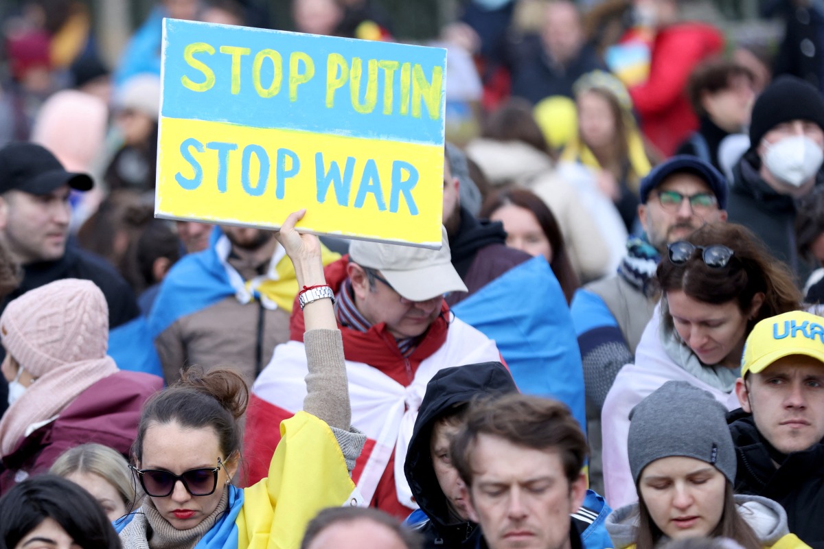 People demonstrate during an Anti-war protest called ''Stand with Ukraine'', amid Russia's invasion, in central Brussels, Belgium March 6, 2022. REUTERS/Yves Herman
