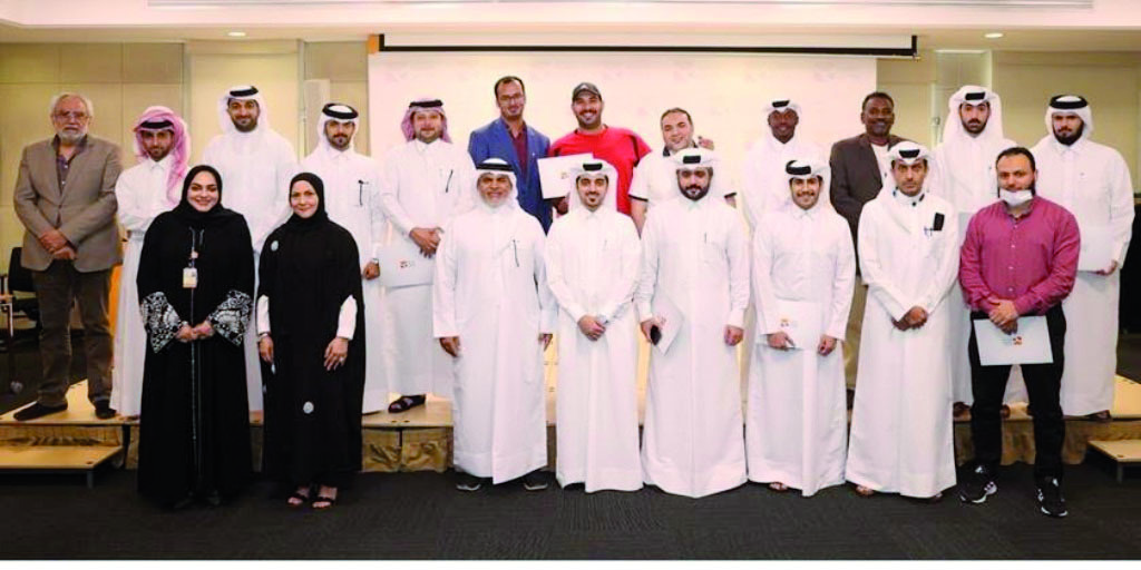 The officials and participants of the Asian Games Management and Organization course pose for a photograph.
