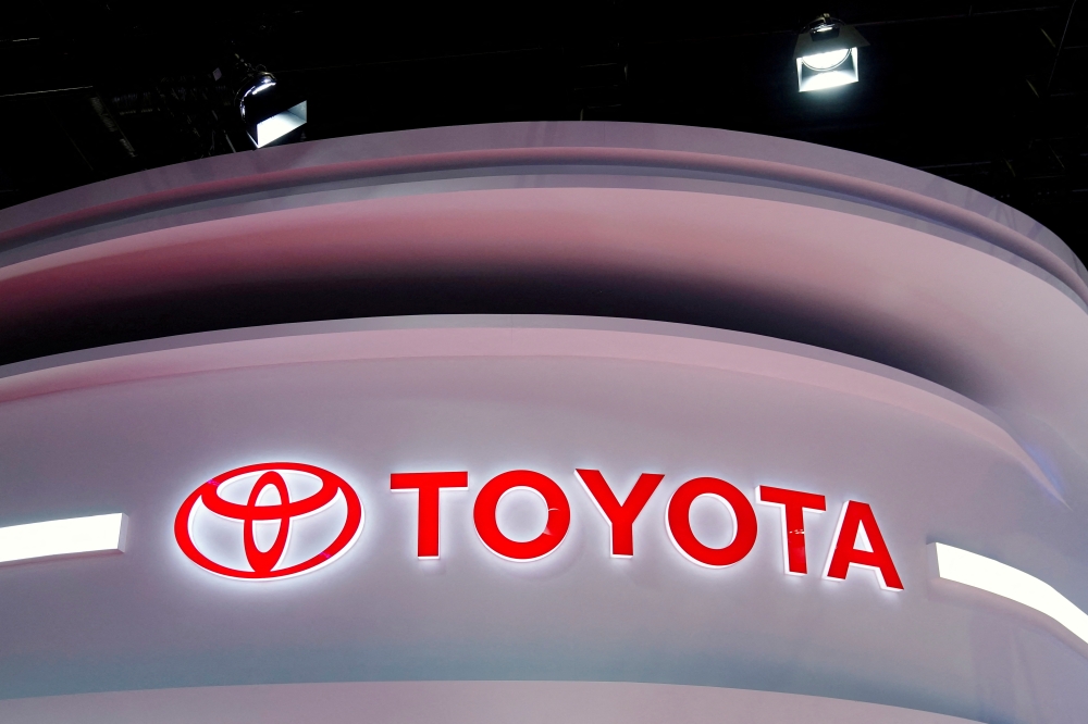 The Toyota logo is seen at its booth during a media day for the Auto Shanghai show in Shanghai, China, April 19, 2021. REUTERS/Aly Song/File Photo