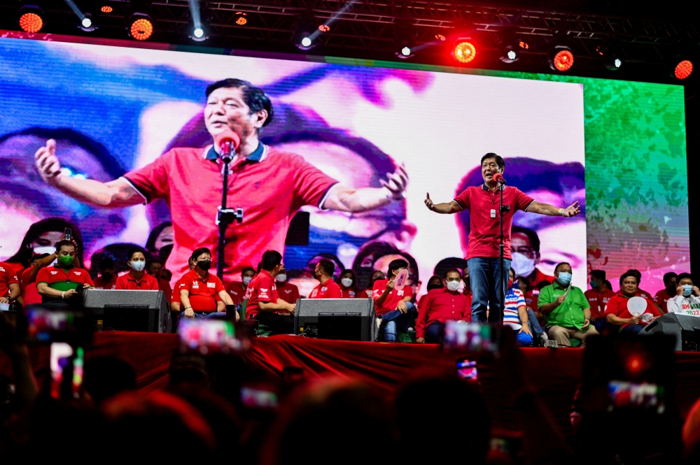 Philippine presidential candidate Ferdinand Marcos Jr., son of late dictator Ferdinand Marcos, gestures as he speaks during a campaign rally in Quezon City, Metro Manila, Philippines, February 14, 2022. REUTERS/Lisa Marie David/File Photo