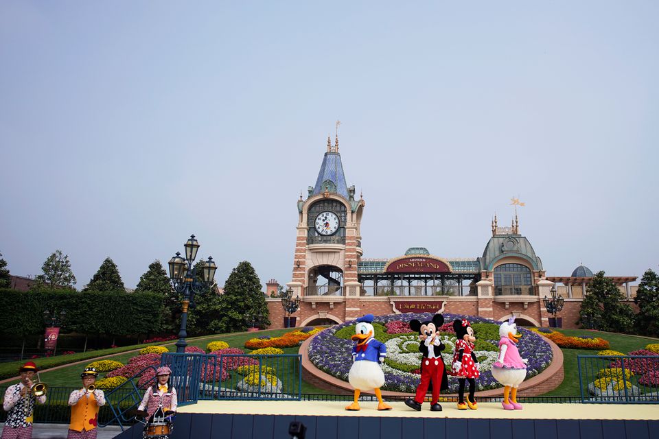 Performers are seen at the ceremony marking the reopening of Shanghai Disneyland following a shutdown due to the coronavirus disease (COVID-19) outbreak, at Shanghai Disney Resort in Shanghai, China May 11, 2020. REUTERS/Aly Song/File photo

