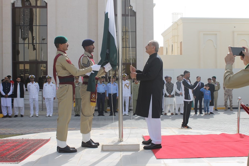 Ambassador Syed Ahsan Raza Shah hoisting the national flag to mark Pakistan Day, at Pakistan Embassy, Doha, yesterday.  