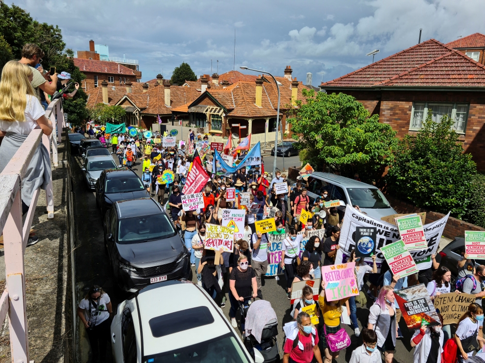 Student climate activists march from Kirribilli House to the Sydney Harbour Bridge, in Sydney, Australia, March 25, 2022. REUTERS/Cordelia Hsu