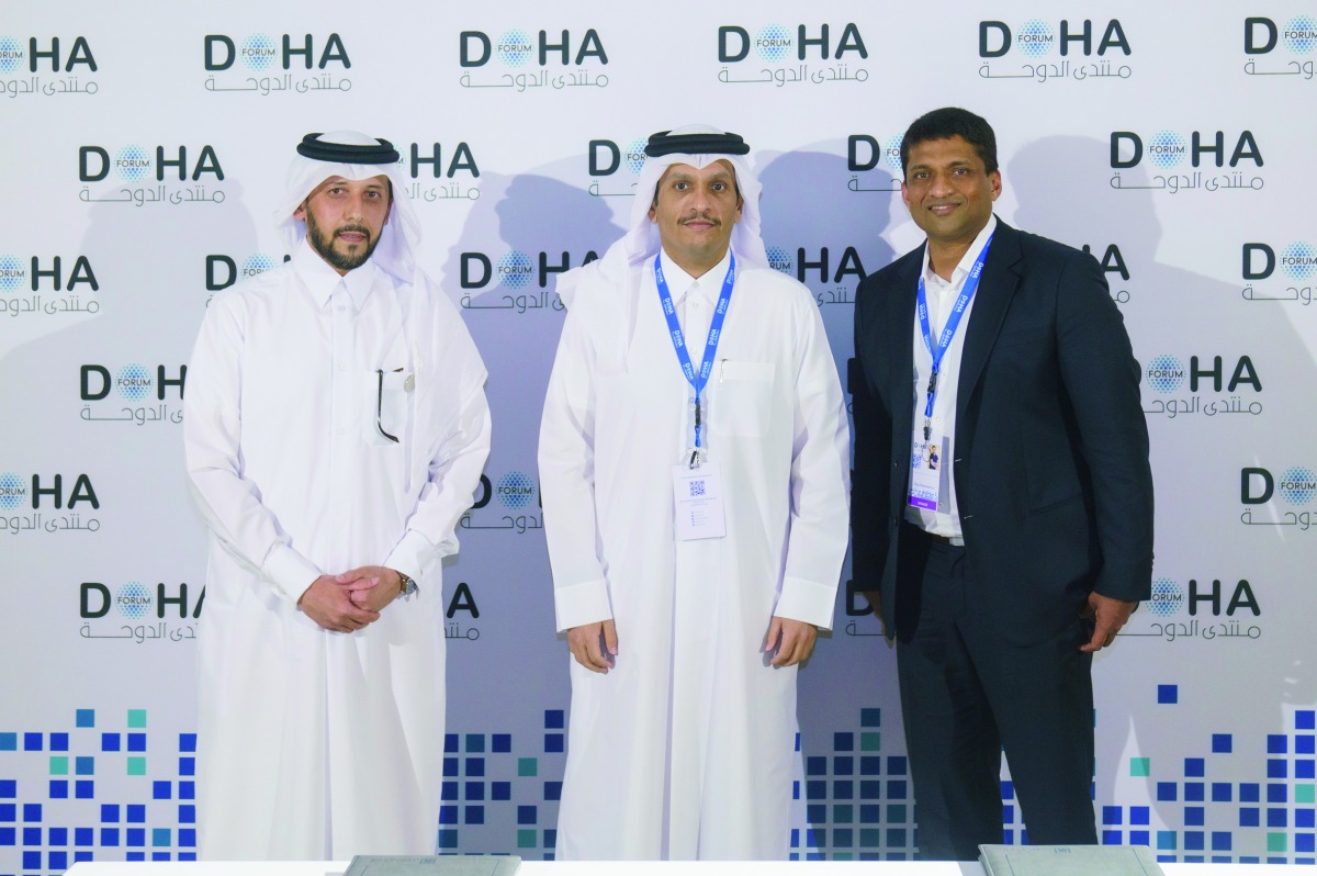 Deputy Prime Minister and Minister of Foreign Affairs and Chairman of QIA H E Sheikh Mohammed bin Abdulrahman Al Thani (centre); CEO of QIA Mansoor Al Mahmoud (left);  and Founder and CEO of BYJU’S Byju Raveendran during the event.