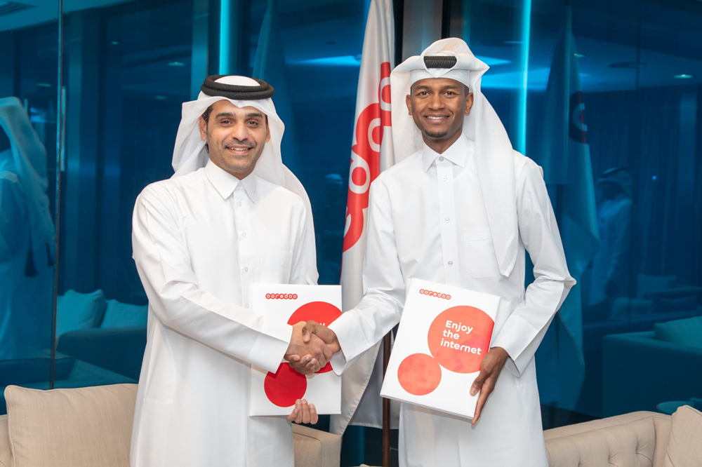 Deputy Group Chief Executive Officer and Chief Executive Officer of Ooredoo Qatar, Sheikh Mohammed bin Abdulla Al Thani and Mutaz Barshim after signing the agreement at Ooredoo headquarters.  