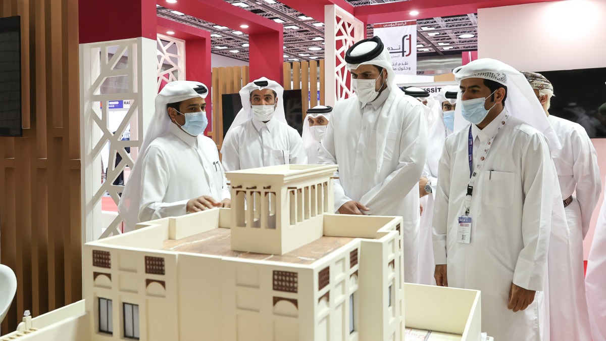 Minister of Commerce and Industry H E Sheikh Mohammed bin Hamad bin Qassim Al Abdullah Al Thani during a tour of the Build Your House Exhibition 2022, yesterday.