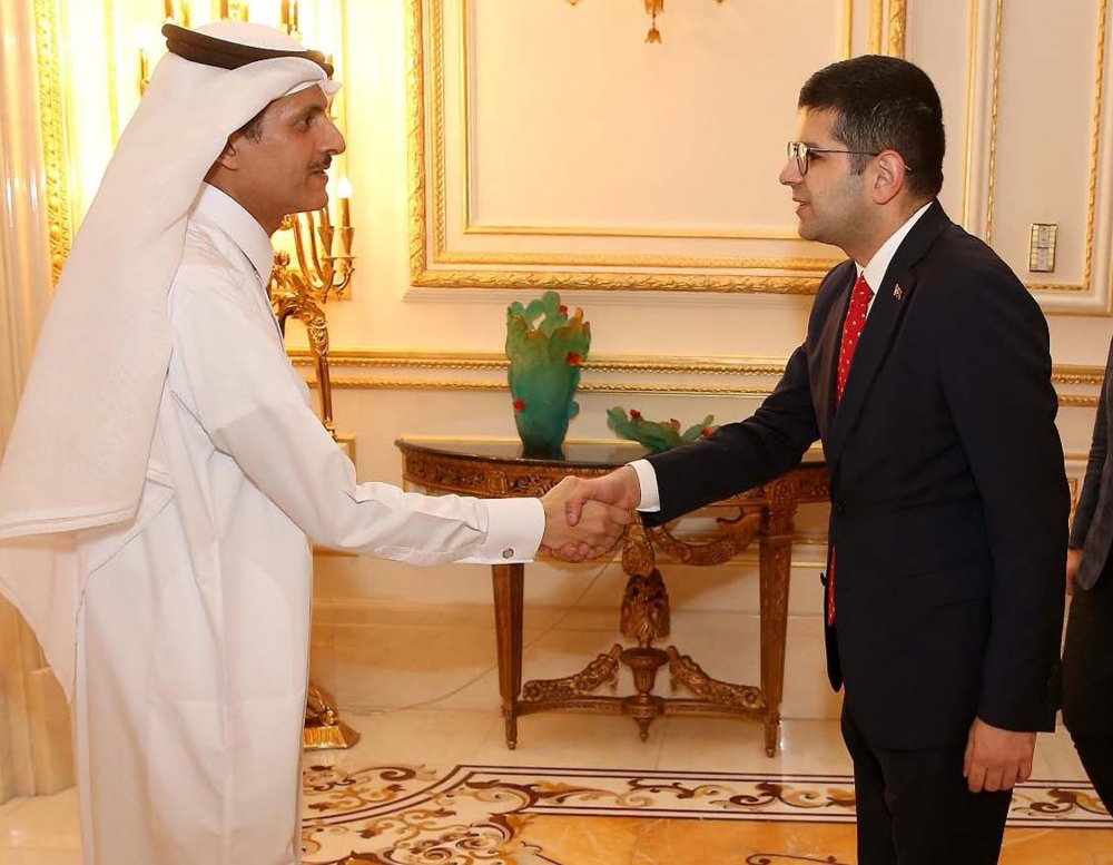 H E Sheikh Dr. Khalid bin Thani bin Abdullah Al Thani, Chairman of the Board of Directors of Qatar International Islamic Bank (QIIB), receiving H E Ahmet Burak Daglioğlu, President of the Investment Office of the Turkish Presidency. 
