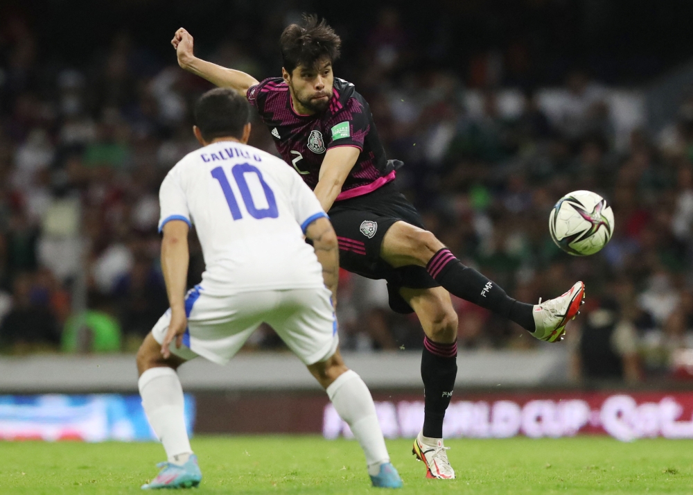  Mexico's Nestor Araujo in action with El Salvador's Eric Calvillo Reuters/Edgard Garrido