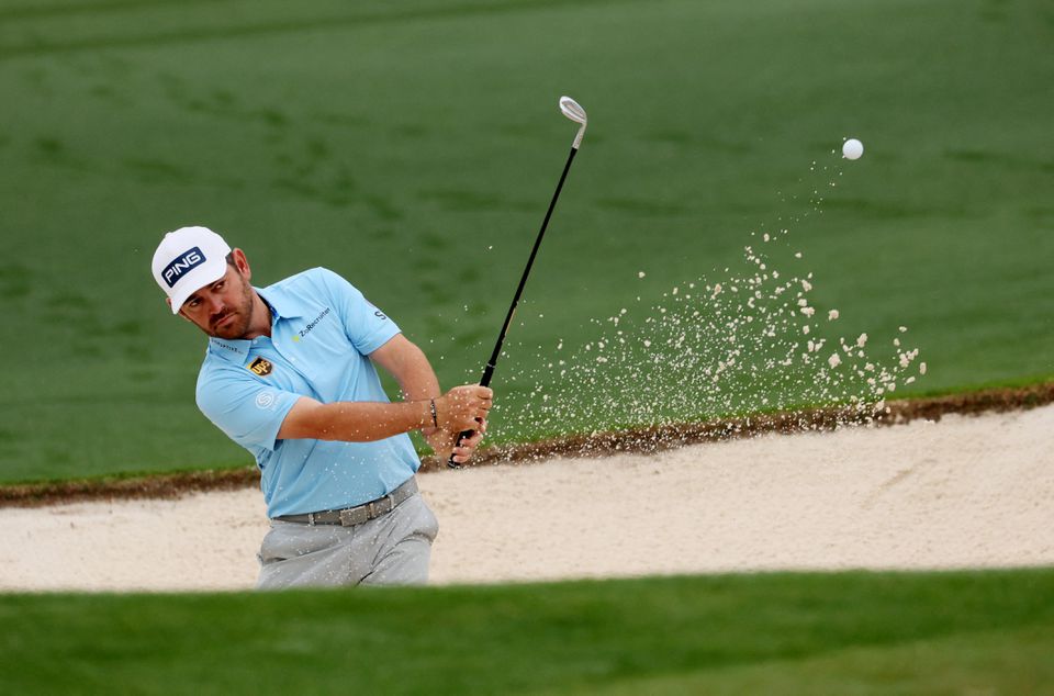 April 6, 2022 South Africa's Louis Oosthuizen plays out from the bunker on the 2nd during a practice round REUTERS/Mike Segar