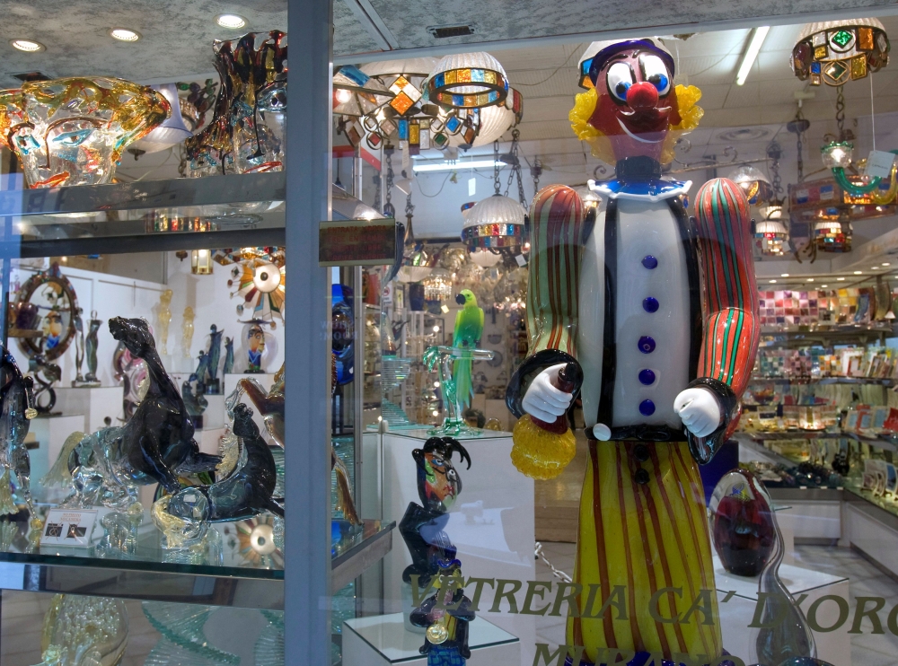 Glass decorations are seen in a shop window on the island of Murano near Venice January 27, 2009. REUTERS/Chris Helgren/File Photo