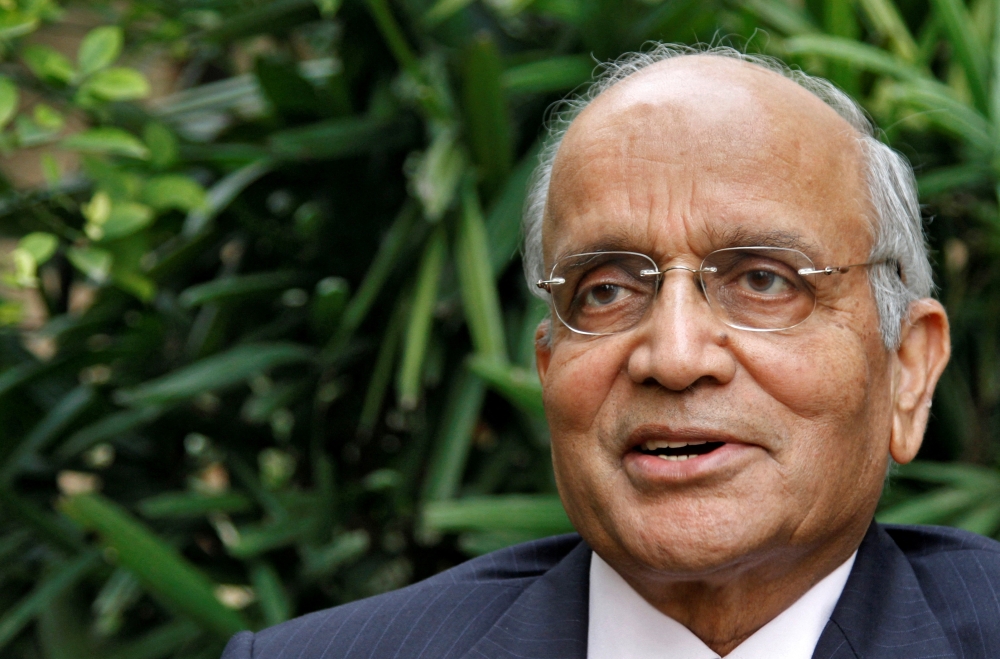 Chairman of Maruti Suzuki India R.C. Bhargava speaks during an interview for the Reuters India Investment Summit at his residence in Noida on the outskirts of New Delhi November 21, 2011. REUTERS/B Mathur (INDIA - Tags: TRANSPORT BUSINESS)/File Photo