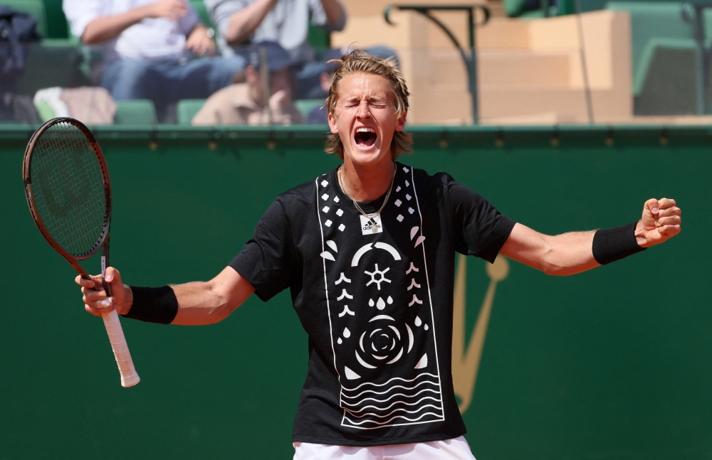 April 13, 2022 Sebastian Korda of the U.S. celebrates winning his second round match against Spain's Carlos Alcaraz Garfia REUTERS/Denis Balibouse