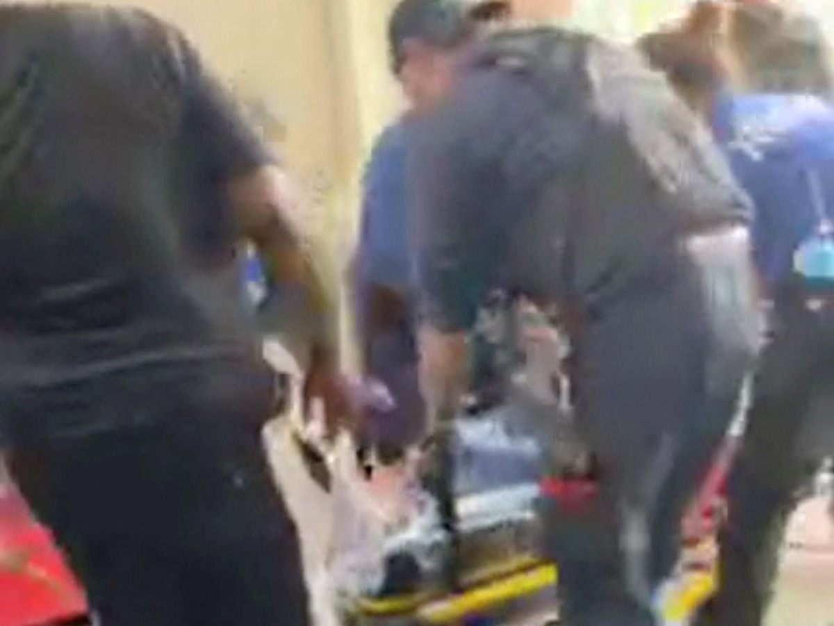 A person is carried away in a gurney in the aftermath of a shooting that took place at a shopping mall in Columbia, South Carolina, in this screengrab from a video obtained from social media. SC Lash Extensions via Reuters