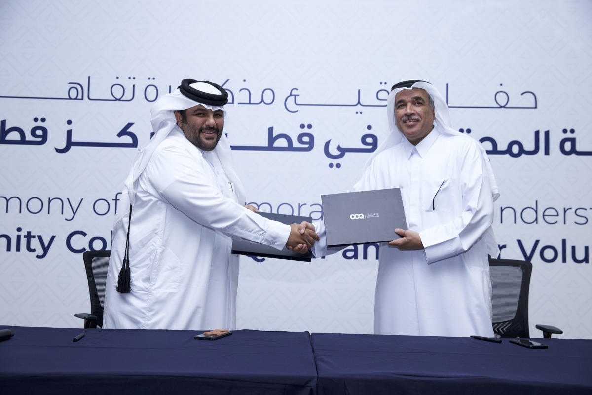 CCQ President Dr. Mohamed Ibrahim Al Naemi and QVC Executive Director Moeed Al Qahtani exchanging the signed documents.